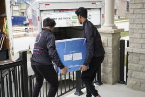 Moving ASAP team loading household goods onto a moving truck